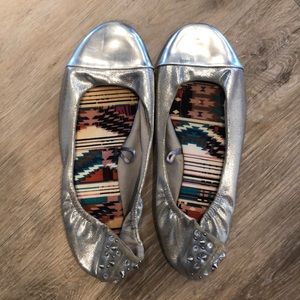 Silver flats with jeweled and spiked heel